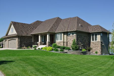 Why You Shouldn't Ignore Those Ugly Streaks on Your Roof